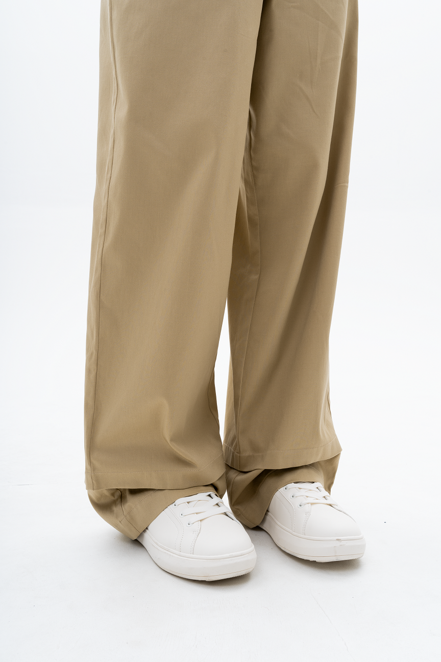 AKANTARA Brown and Navy Pants displayed in various sizes, highlighting baggy fit for women